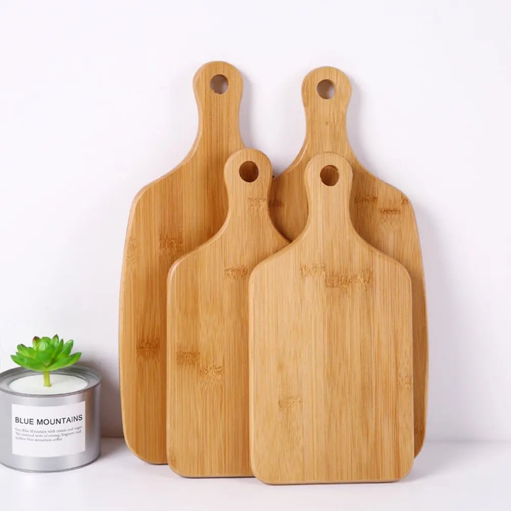 Eco - Friendly Bamboo Cutting Board with Handle – Sustainable Kitchen Essential | ThriveMinded & WellHaven Co - ThriveMinded & WellHaven Co